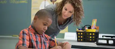 image of volunteer with student